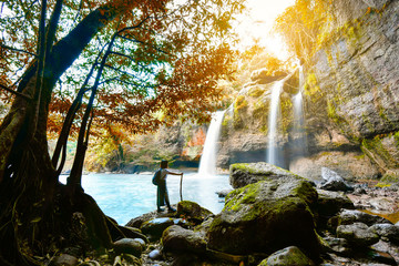 woman in Haew Suwat Waterfall at Khao Yai National Park © baitong333