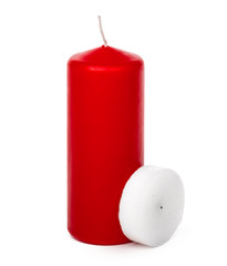 Obraz premium Wax colored candle isolated on white background close up