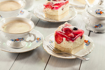 Cheesecake with strawberries, blueberry and jelly