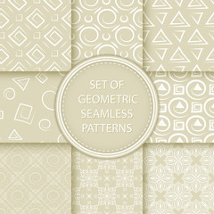 Compilation of seamless patterns. White abstract and geometric prints on olive green background