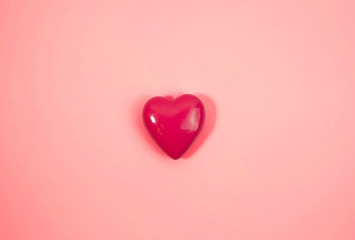 Big pink heart on pink backround. Love concept