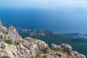 Fototapeta na wymiar Beautiful view from the top of Mount Ai-Petri in the Crimea to Koreiz against the backdrop of the sea