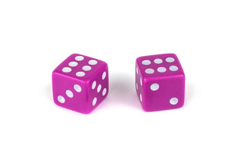 Two plastic pink dice isolated on white background, clipping path with shadow