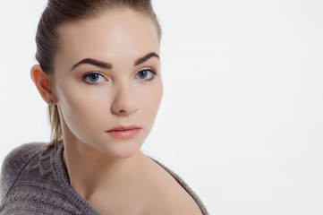 Naklejka premium Beautiful adult girl posing with nude makeup