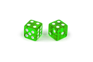 Two green glass dice isolated on white background. Four and four.
