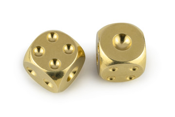 Two golden dices closeup isolated on white background. Four and one, with a shadow.