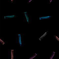 Set of Colored Condoms Isolated on Black Background. Seamless Pattern