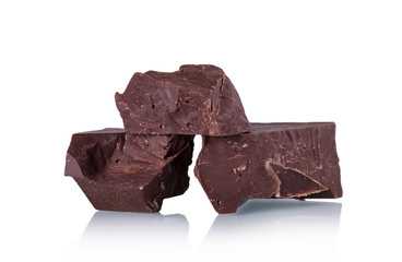 Delicious pieces of dark chocolate isolated on white