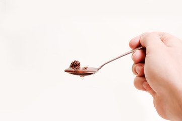 Pine cones jam on white background