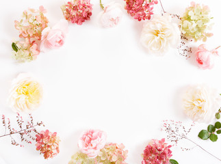 Obraz na płótnie Canvas Festive flower composition on the white background. Overhead view