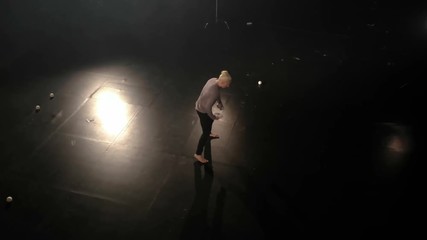 Aerial shot - Circus juggler makes amazing tricks with balls.