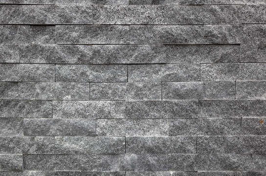 Fototapeta gray brick wall with rough texture