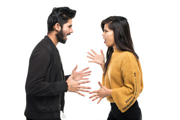 Indian young couple quarreling isolated on white background