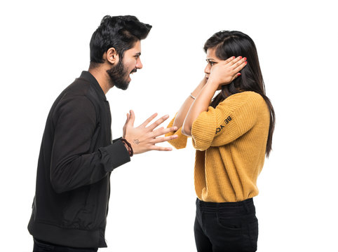 Indian young couple quarreling isolated on white background