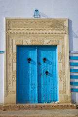 Blue door in Kairouan city in Tunisia