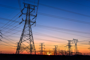 Contour of Transmission Tower at Sunset