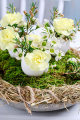 How to make Easter table centerpiece with carnations, wax flower, eggs and moss