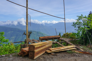 Fototapeta na wymiar Logs and boards in the Himalayan mountains in Sikkim, India