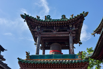 Ancient Chinese Architectural Gateway Wall under Clear Sky and White Cloud, Pingyao County,...