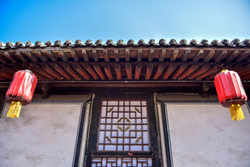 Ancient Chinese Architectural Gateway Wall under Clear Sky and White Cloud, Pingyao County,...
