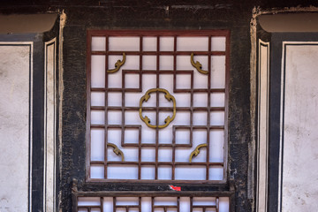 Ancient Chinese Architectural Gateway Wall under Clear Sky and White Cloud, Pingyao County,...