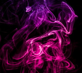 Colored smoke on black background