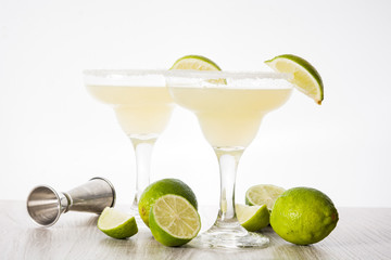 Margarita cocktails with lime in glass isolated on white background.
