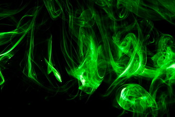 Green smoke on black background