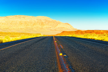 Endless American asphalt roads in Arizona state.