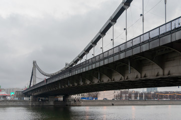 Moscow, Russia - January 08 2012: down-top view onto the Krymskyi bridge spanning over the Moskva river in the winter