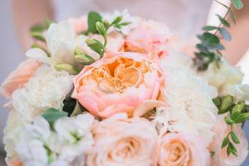 Bridal bouquet of tender peonies