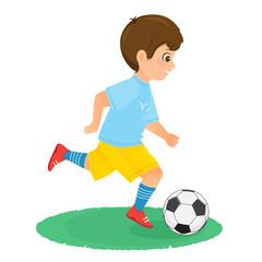 Boy soccer player in uniform with a soccer ball.