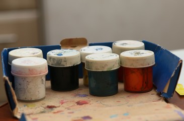 Some jars with paint 