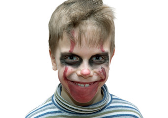 six year old boy in terrifying make up on white background