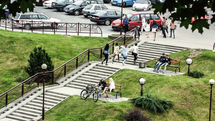 Grodno, Belarus, May 28, 2014: Fragment of public garden and city streets.