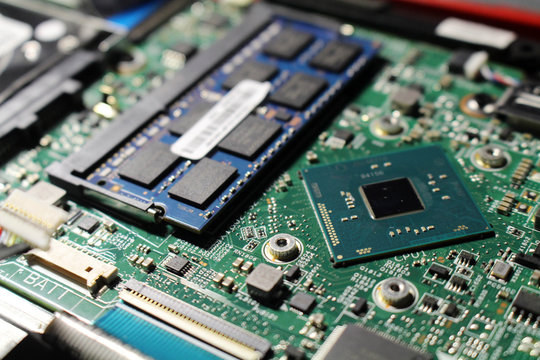 Closeup view at laptop motherboard and components.