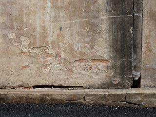 age street wall with crack