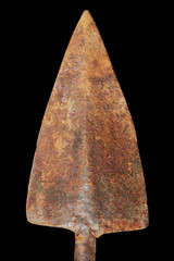 Triangular rusty tip of an old spear isolated