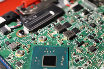 Closeup view at laptop motherboard and components.