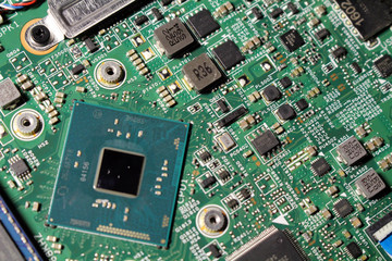 Closeup view at laptop motherboard and components.