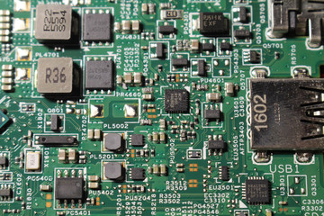 Closeup view at laptop motherboard and semiconductors components