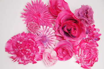 Pile of purple flowers isolated on white background, closeup shot