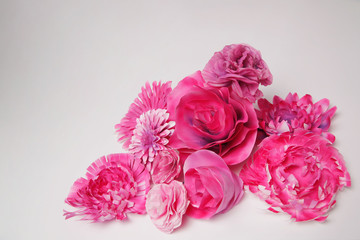 Pile of purple flowers isolated on white background, closeup shot