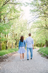 Fototapeta premium young couple walking in the park