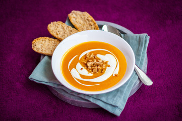 Homemade carrot and sweet potato cream soup
