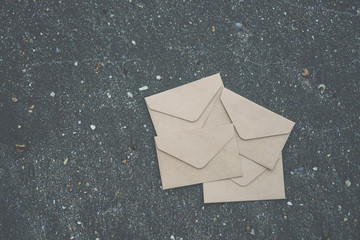 many od envelope imply for sending mail on sand texture background.