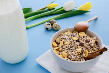 Healthy cereal breakfast with cinnamon and milk.