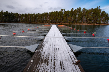 wooden jetty with y bars waiting for boats