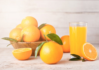Glass of raw organic fresh orange juice with fruit