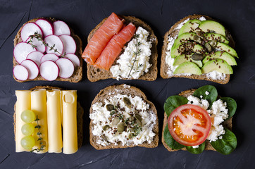 sandwiches with various fillings: ham, cheese, avocado, sauce